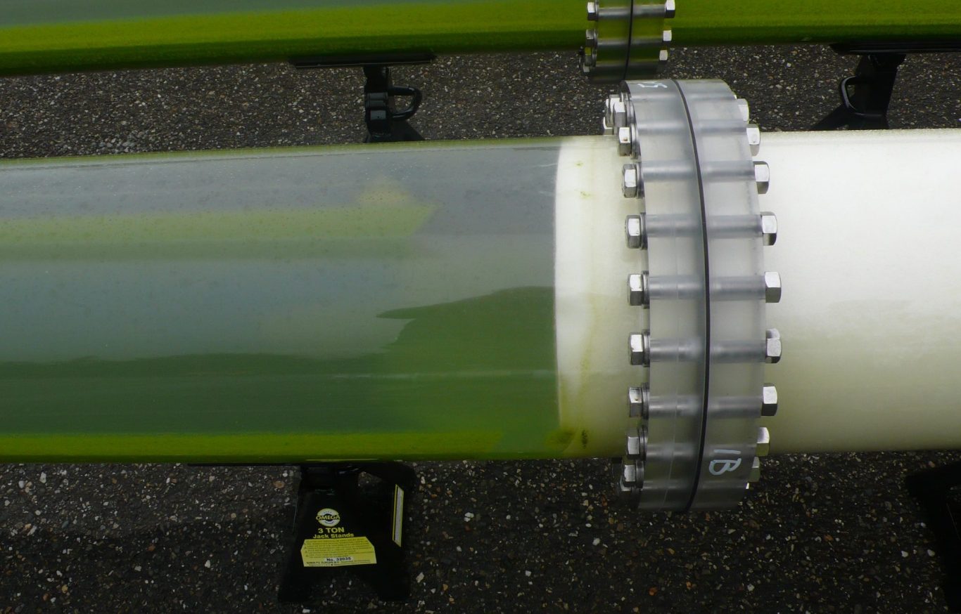Water-driven cleaning sponge inside transparent tube – scrubbing biofilm, pushed by flow, with automatic docking station
